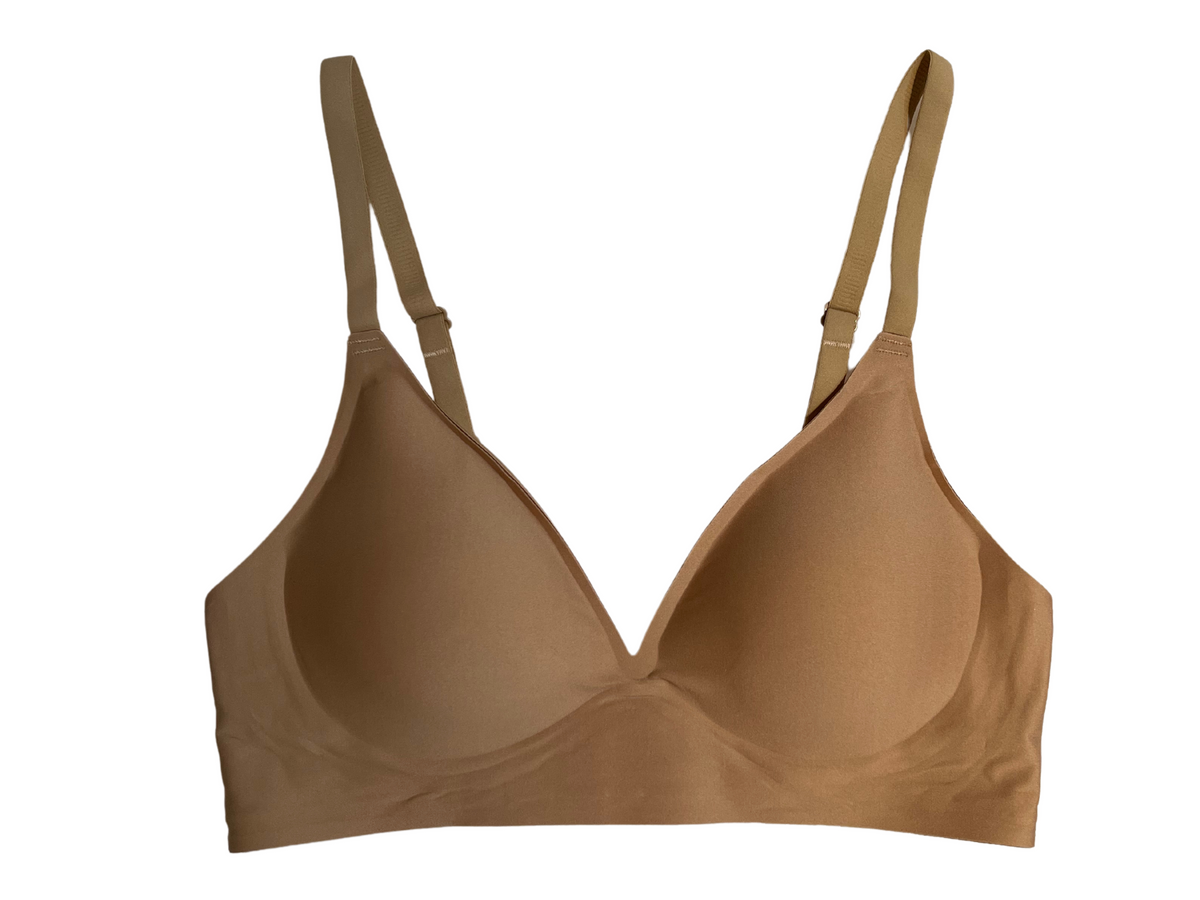 Brezšivni nedrček Lings OCHRE, ležeč na beli podlagi